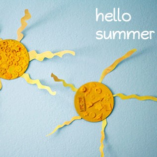 Two playful suns crafted from yellow paper on a light blue background with the text "hello summer."