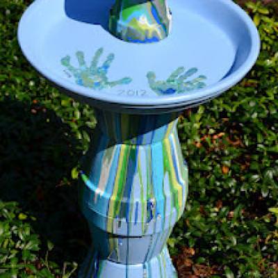DIY Pour Painted Terra Cotta Pot Bird Bath in Blues & Greens