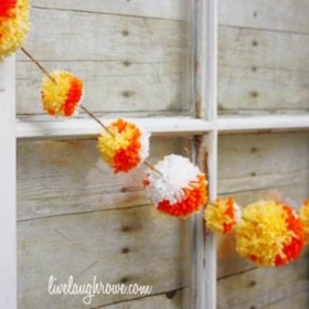 Candy Corn Pom Poms {halloween home decor}